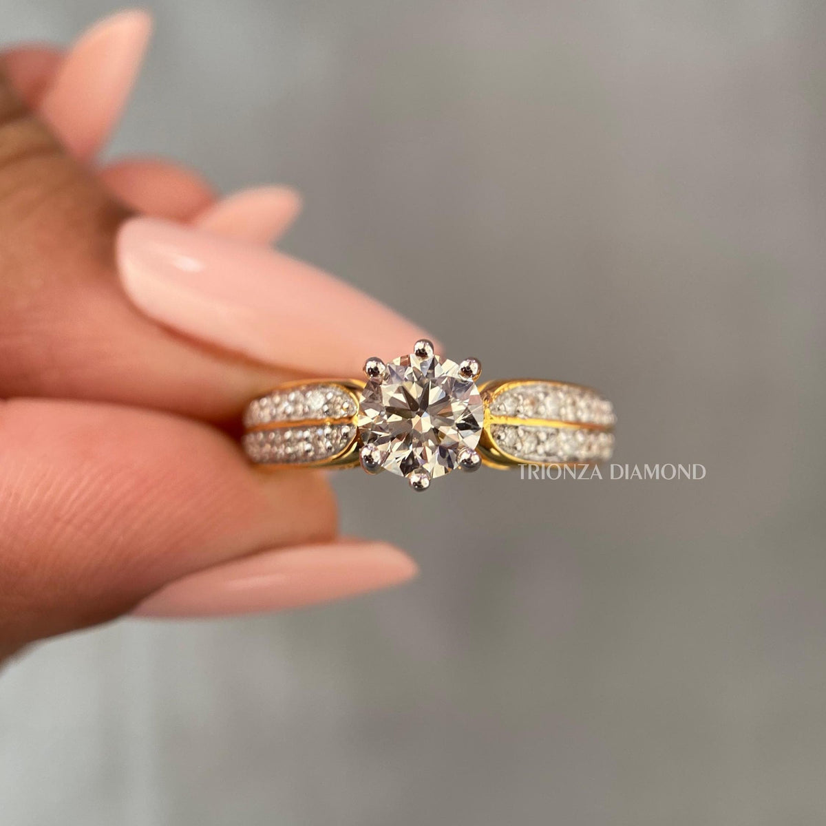 Brilliant cut diamond proposal ring displayed to highlight its D color and VVS1 clarity