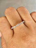 Dainty lab grown diamond wedding ring designed for stacking with engagement rings