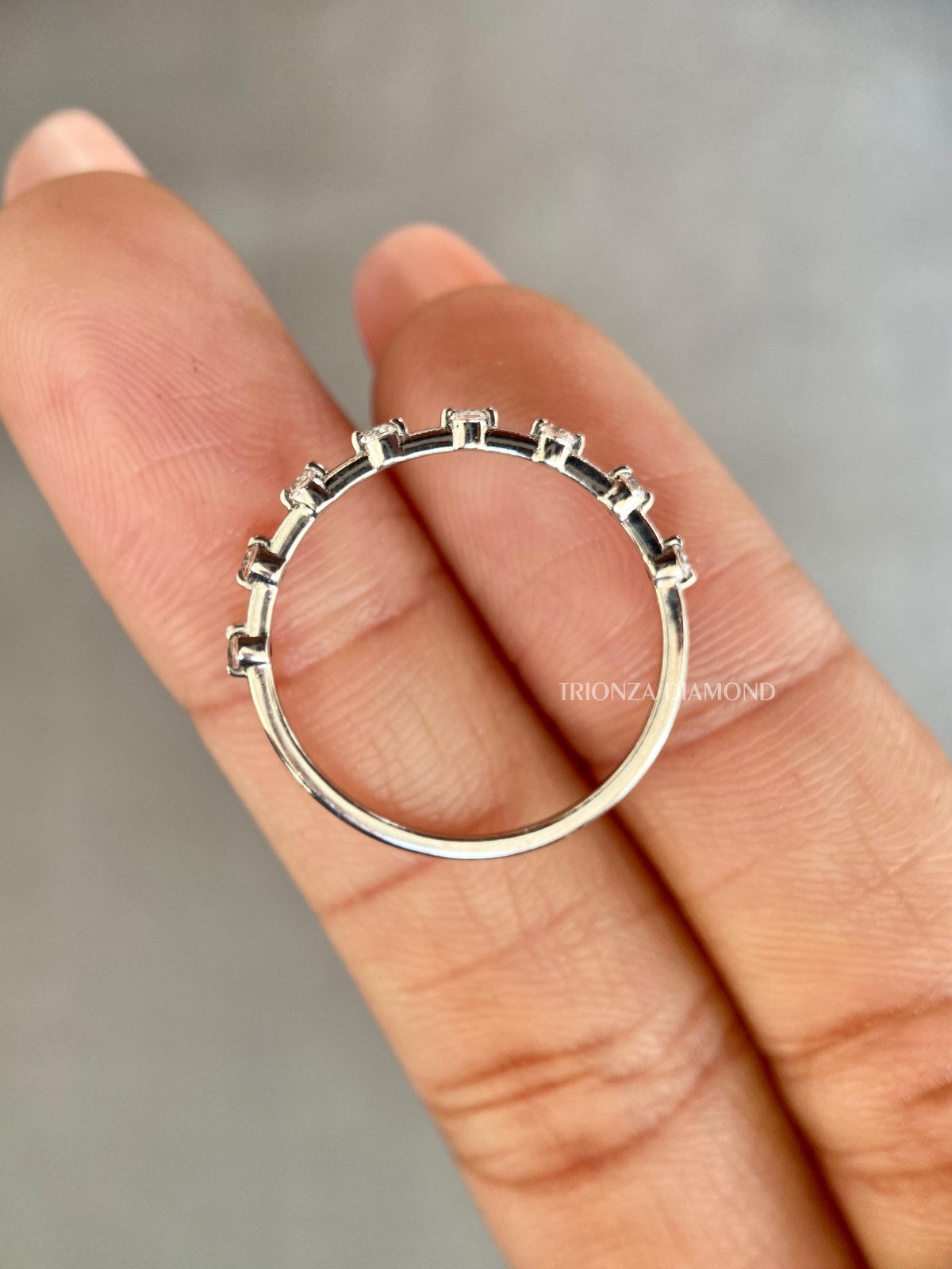 TrionzaDiamond half eternity band featuring D/E VVS-VS lab grown round diamonds