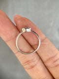 Bezel set oval diamond ring available in yellow, white, or rose gold