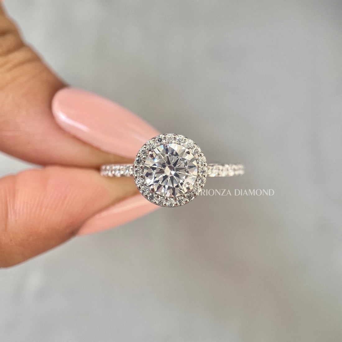 Round brilliant lab grown diamond halo engagement ring with vintage inspired detailing