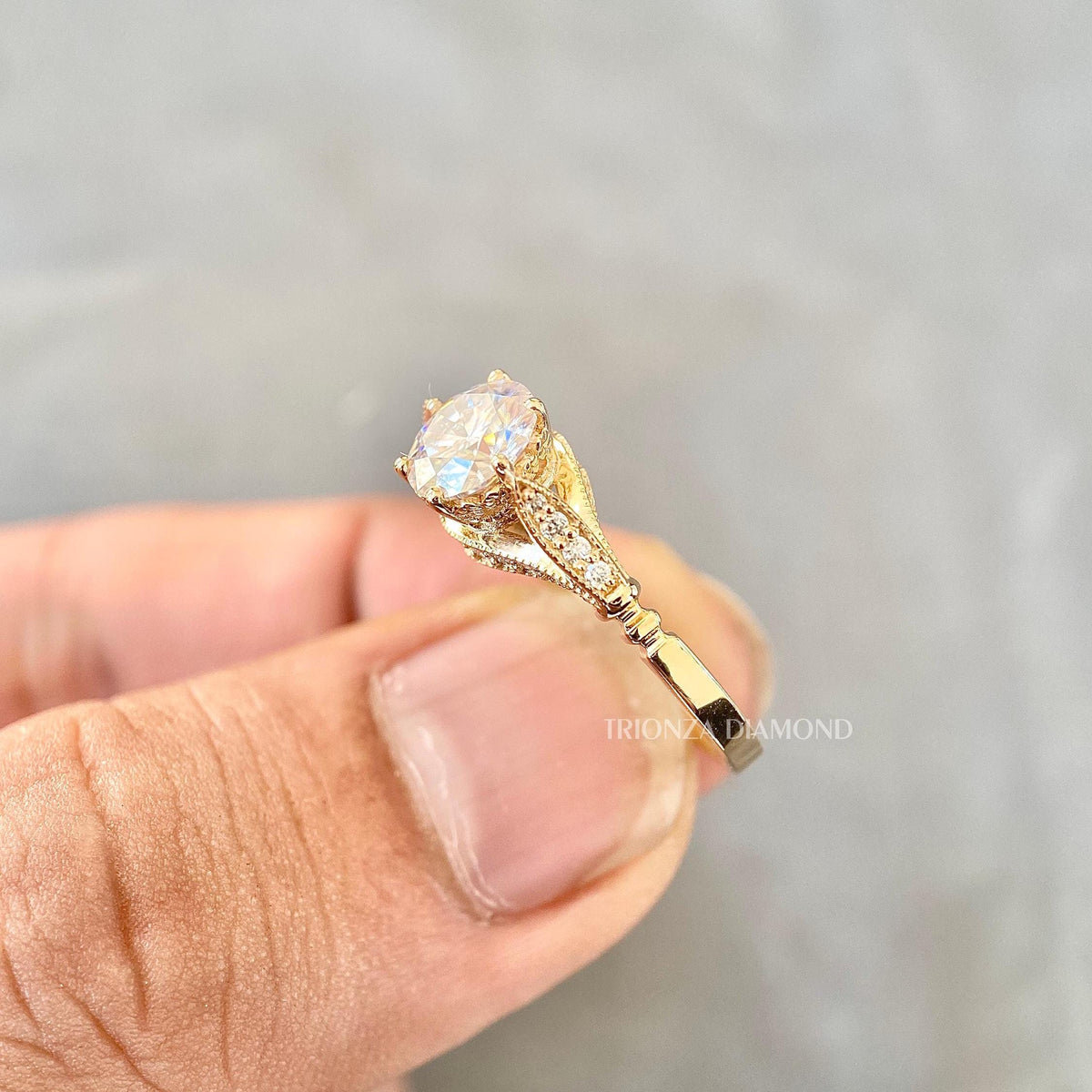 TrionzaDiamond floral ring designed with a round center diamond and 0.20 carat accents