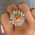 Close-up of the 2 CT cushion cut diamond showing its vivid yellow color and brilliance