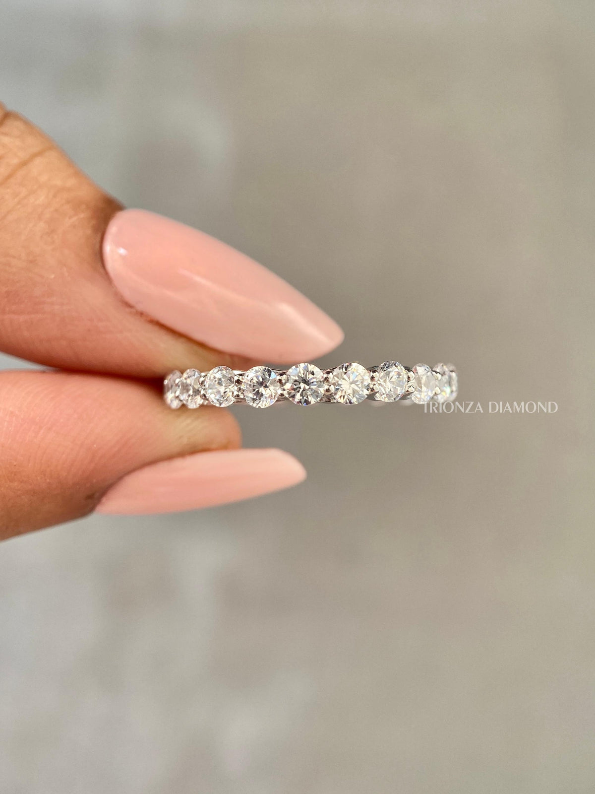 Diamond wedding ring for women captured in natural light to show its brilliance