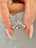 Marquise cut lab grown diamond curved wedding band displayed to show its vintage stackable design