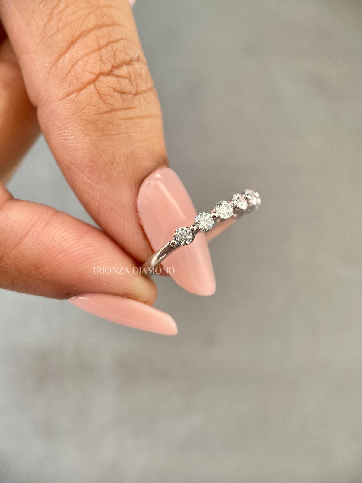 TrionzaDiamond eternity ring crafted with 0.42 carat round cut lab grown diamonds
