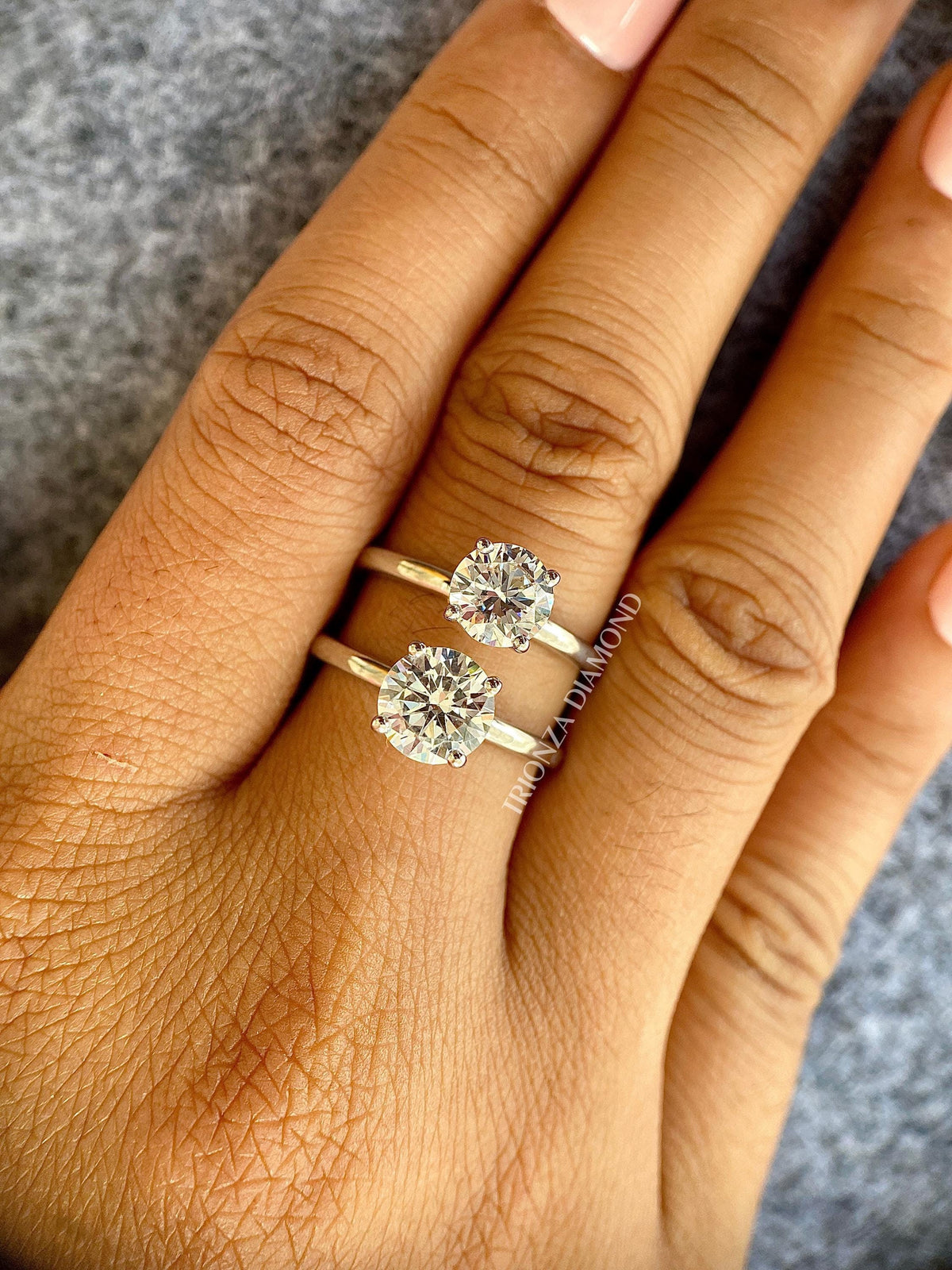 Close-up of the D color VVS2 diamond showcasing its brilliant round cut facets
