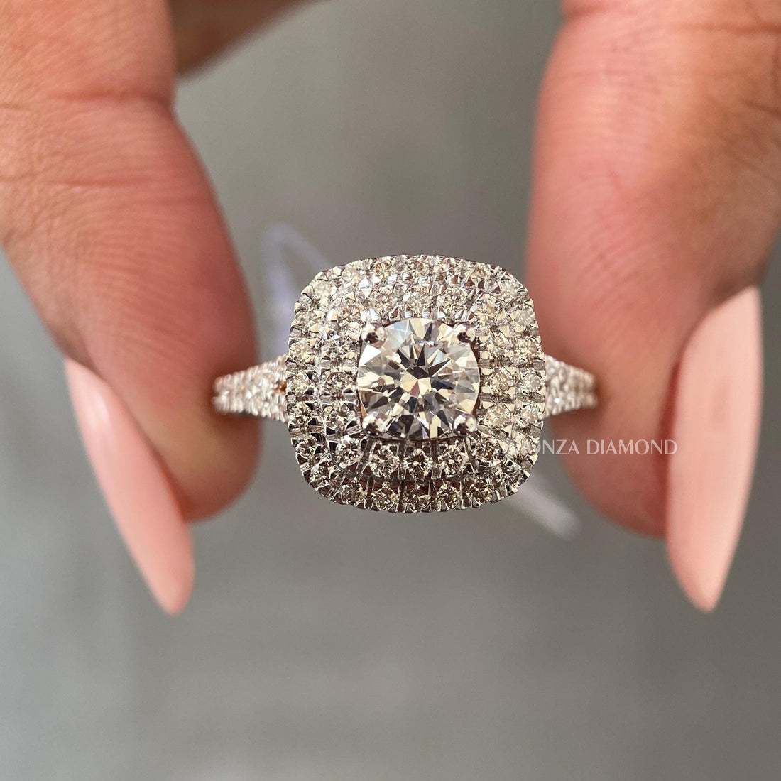 Round cut diamond ring with double cushion halo design shown in 14K solid gold