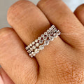 Full eternity band displayed to highlight its D/E color and VVS/VS clarity diamonds