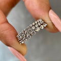 Floating bubble wedding band featuring round lab grown diamonds set in a full eternity design