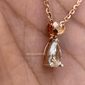 TrionzaDiamond pendant necklace featuring an IGI certified 0.52 TCW pear cut diamond