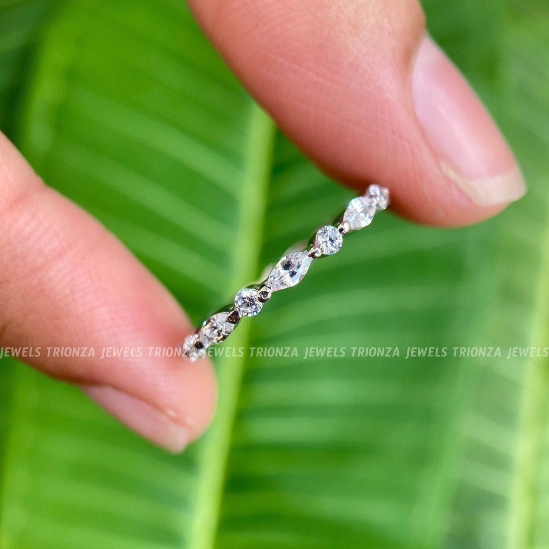 Vintage moissanite full eternity wedding band featuring alternating round and marquise cut stones