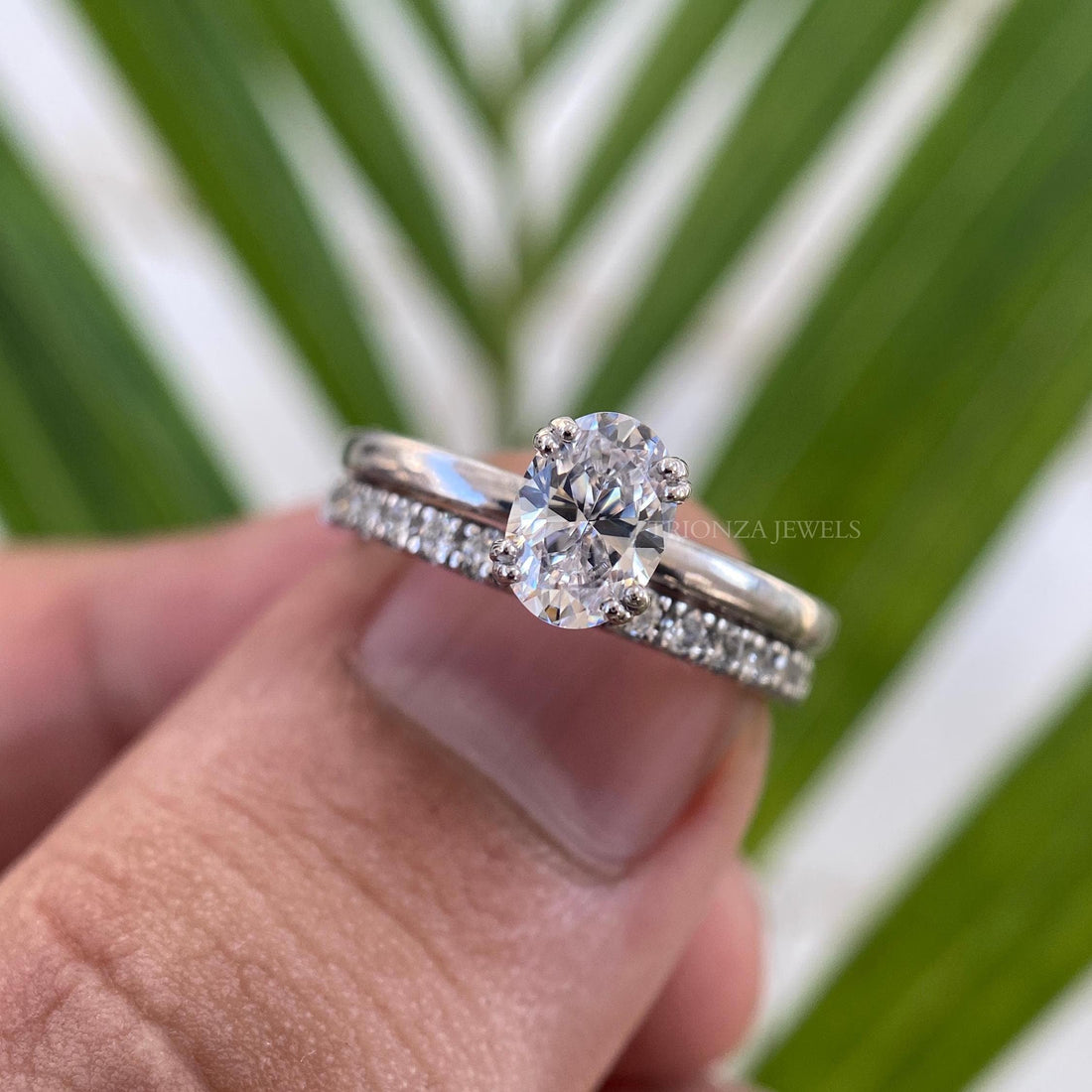 Vintage art deco oval moissanite engagement ring set crafted in 14k gold