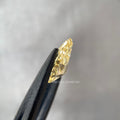 Handmade engagement ring featuring a VS clarity pear cut yellow lab grown diamond