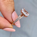 radiant cut with round side stones