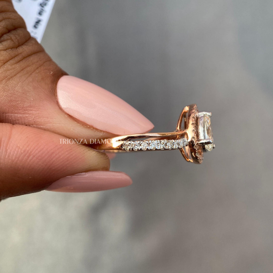 Intense yellow pear cut lab diamond ring crafted in 14k rose gold two tone design