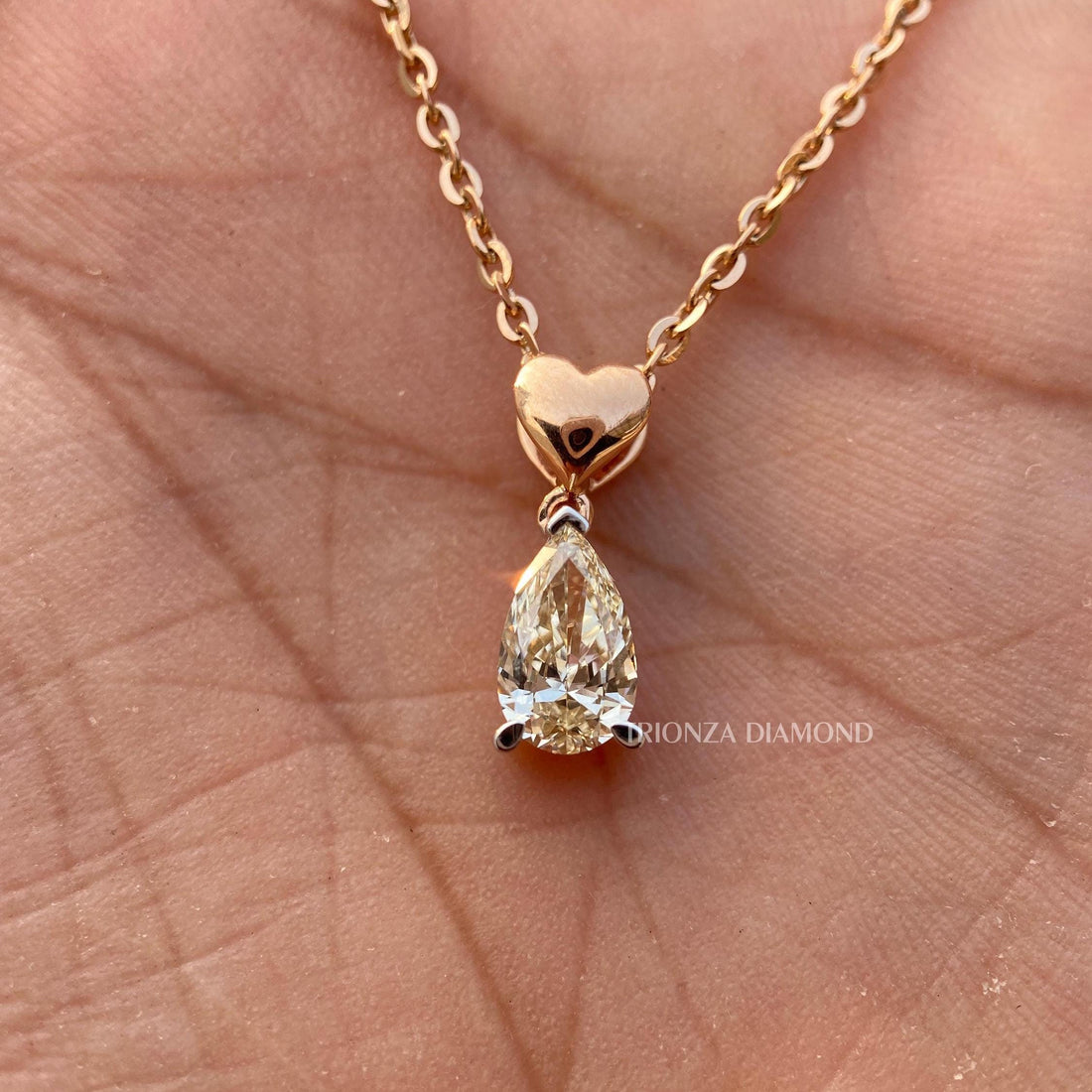 Pear cut lab grown diamond pendant crafted in 14K solid gold for a timeless look