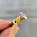 Close-up of the bezel setting securing the 3.50 CT radiant cut diamond center stone
