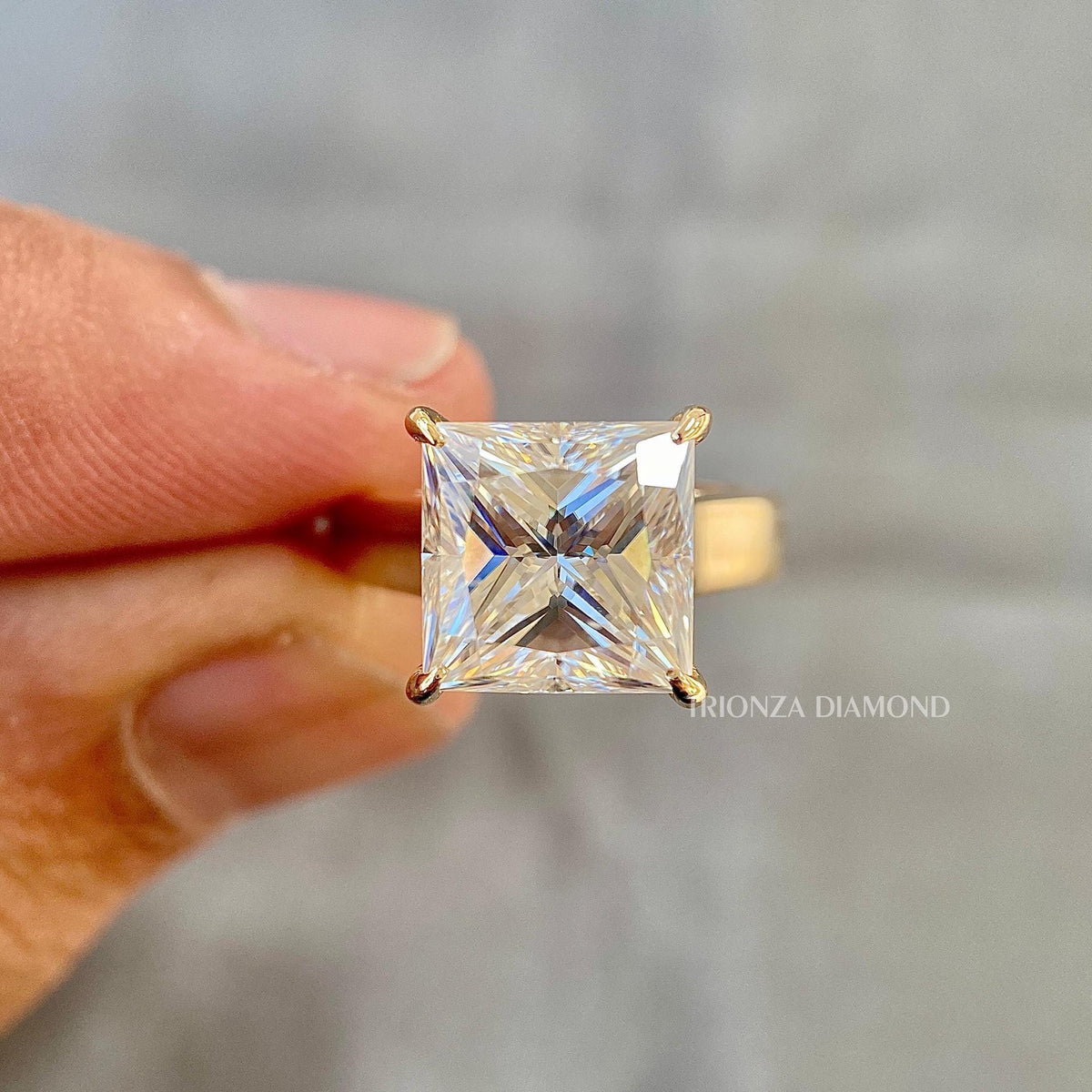 TrionzaDiamond engagement ring displayed in its jewelry box with smooth fabric