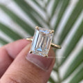 TrionzaDiamond engagement ring presented in its jewelry box with a smooth fabric cloth