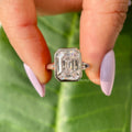 Close-up of the 3ct emerald cut moissanite stone showing its colorless VVS clarity