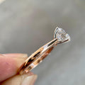 E color VVS2 diamond solitaire ring crafted as a minimalist wedding ring for her