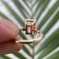 Side view of the emerald cut moissanite ring showing the 8.00 x 12.00 MM stone measurement