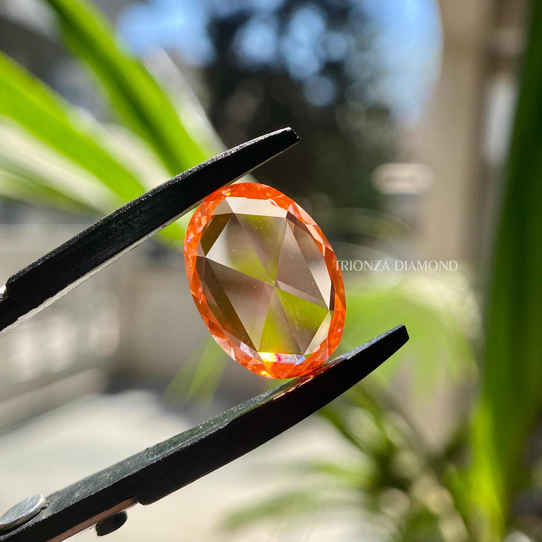 Oval rose cut lab grown diamond displayed as a loose stone with vintage flat cut styling