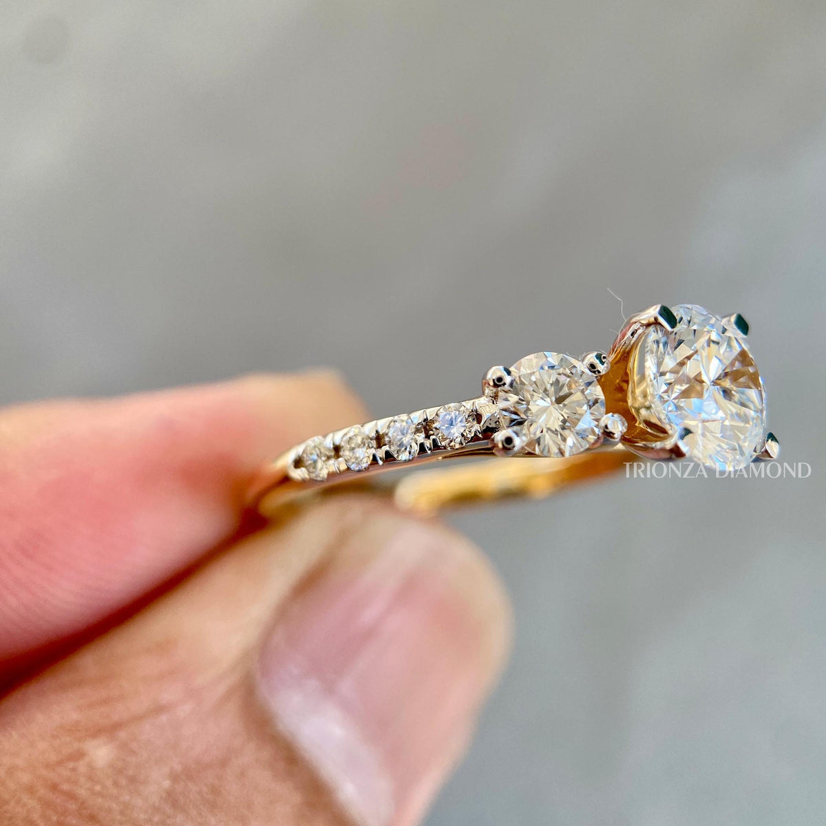 Close-up of the round cut lab grown diamonds showing E color and VVS1 clarity