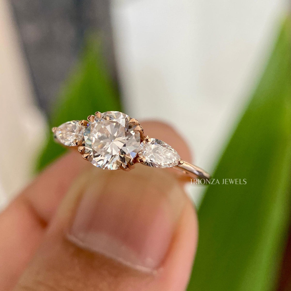 Solid gold engagement ring showcasing the unique double prong setting design