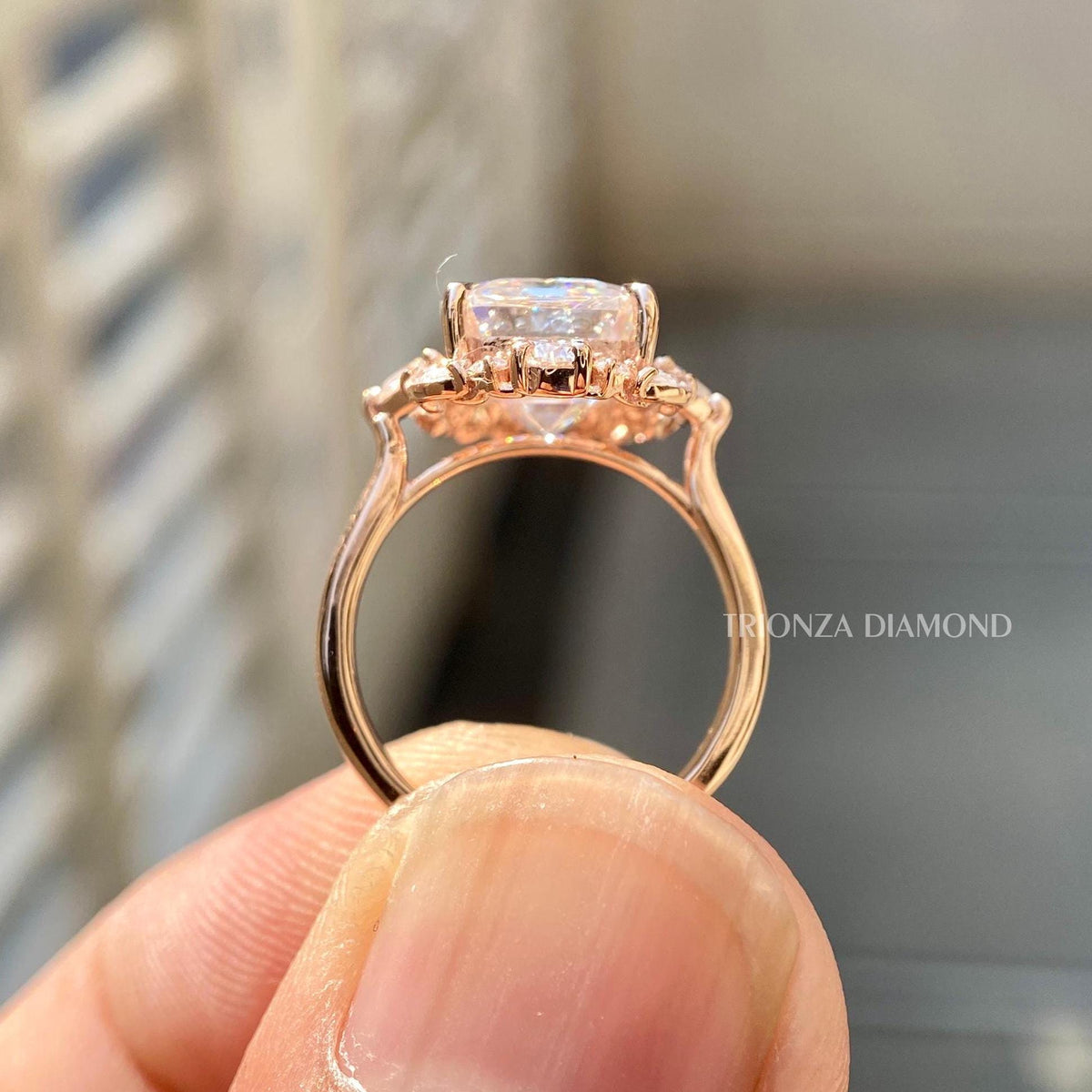 Close-up of the 4 CT emerald cut diamond showing its F color and VS1 clarity