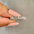 Zigzag half eternity wedding band featuring baguette and round cut lab grown diamonds