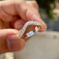 Woman wearing the sustainable lab grown diamond chevron ring as an anniversary gift