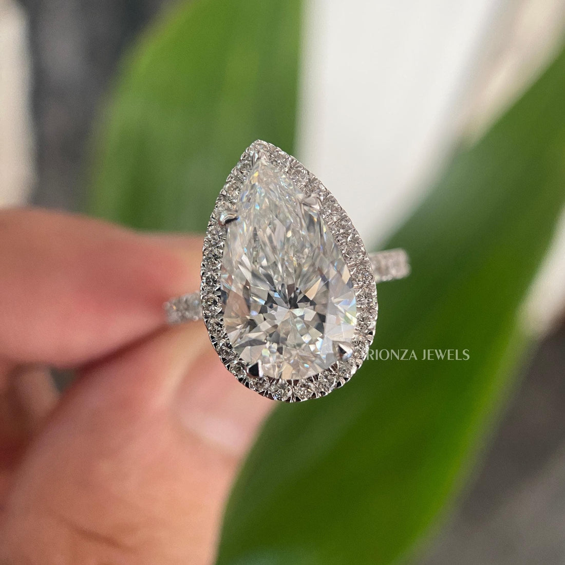 Vintage pear cut halo moissanite engagement ring crafted in 14K gold for her