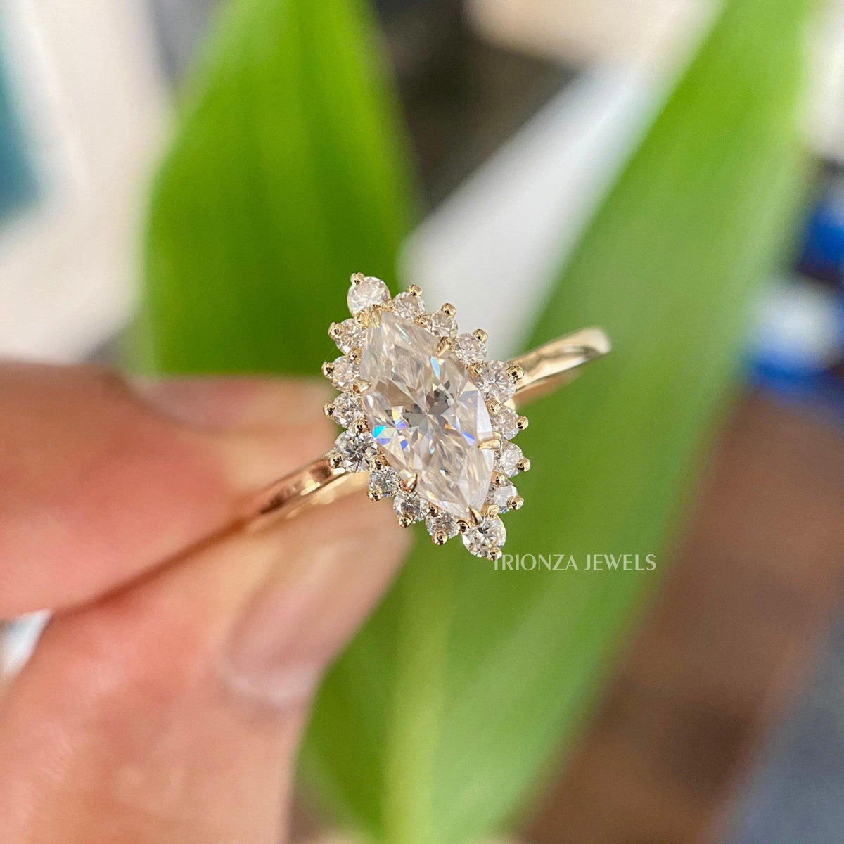 Marquise cut moissanite halo engagement ring crafted in 14K solid gold for lasting elegance