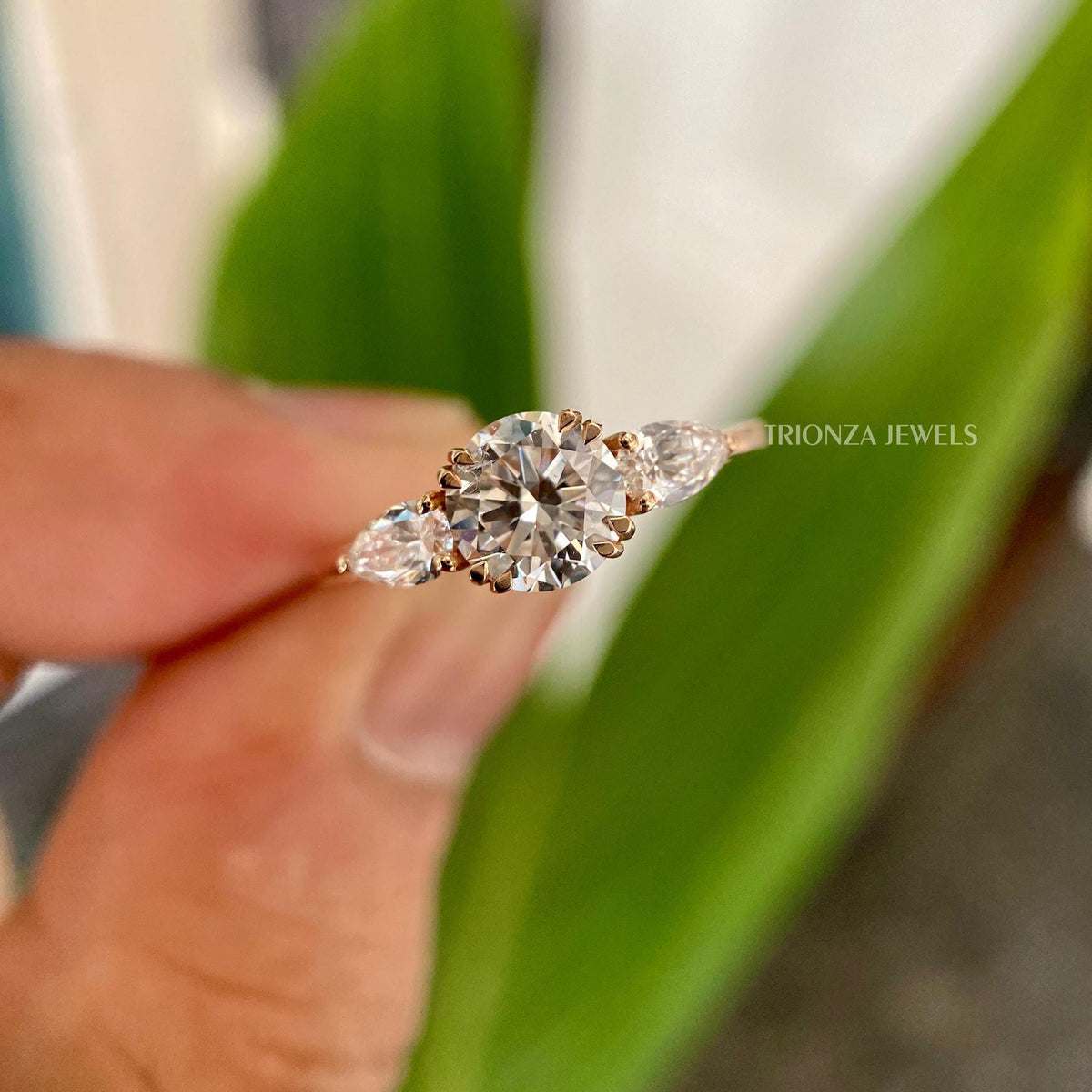 TrionzaDiamond three stone ring designed as a meaningful anniversary gift for her