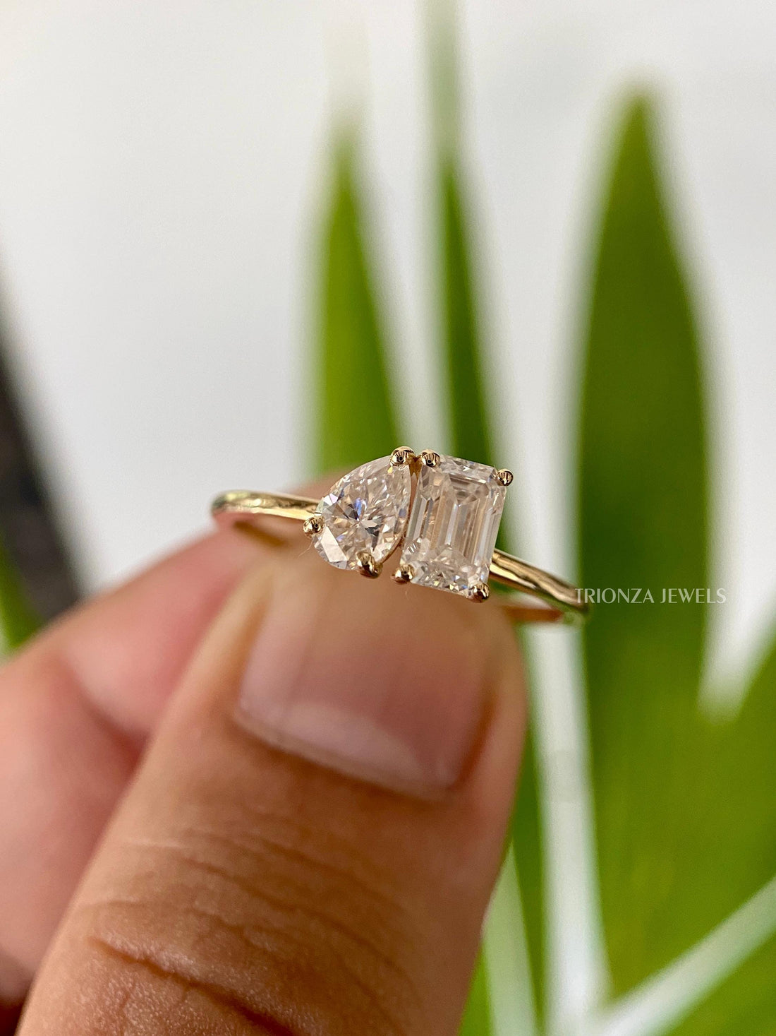 0.93 TCW Pear Emerald Moissanite Toi Et Moi Engagement Ring