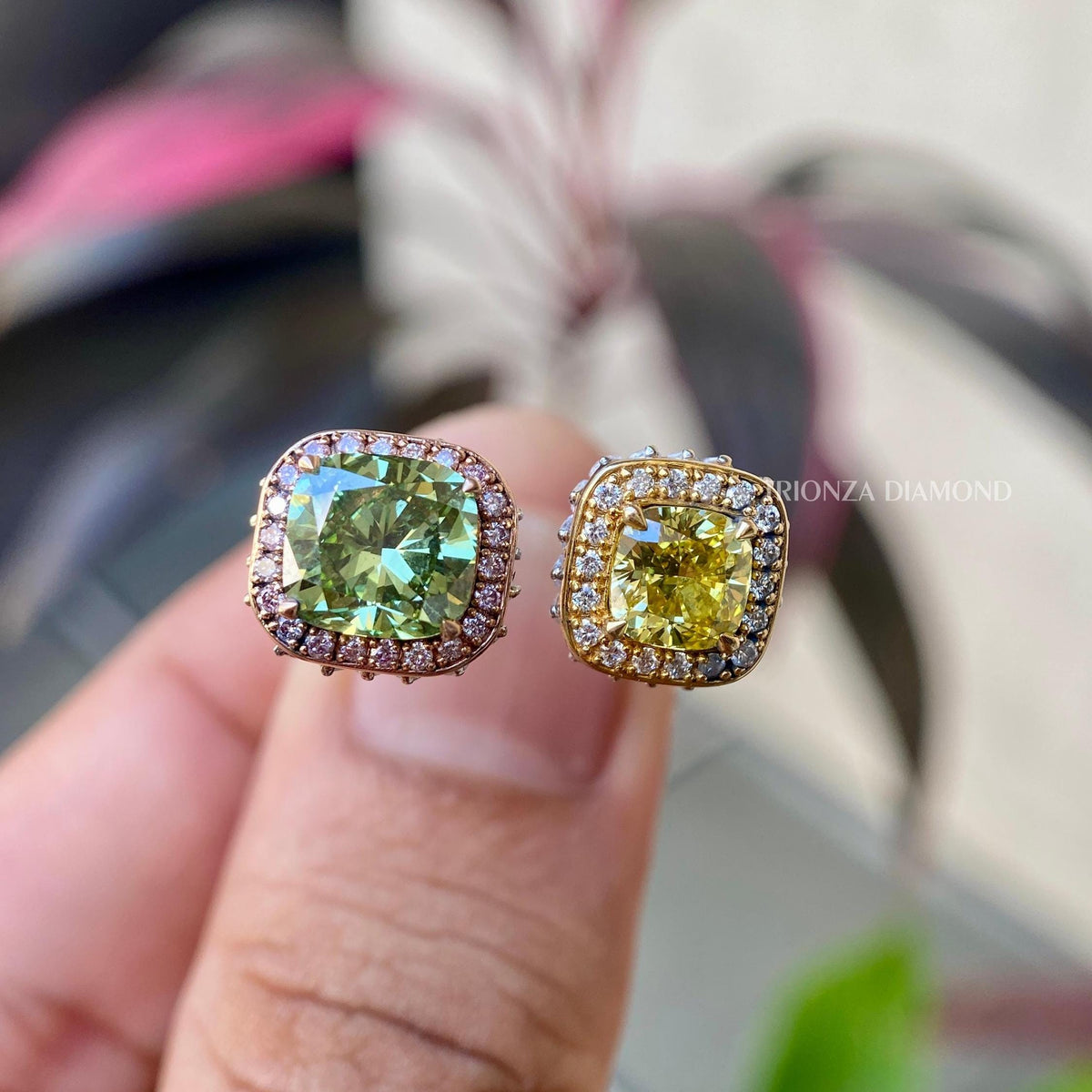 Side view of the double head ring showcasing the yellow and green diamond pairing