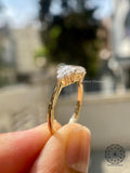 14k yellow gold ring displayed to highlight its clean, uniform straight shank band