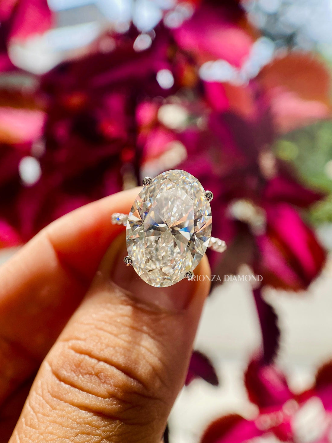 Oval cut lab grown diamond engagement ring showcasing brilliant F color and VS1 clarity