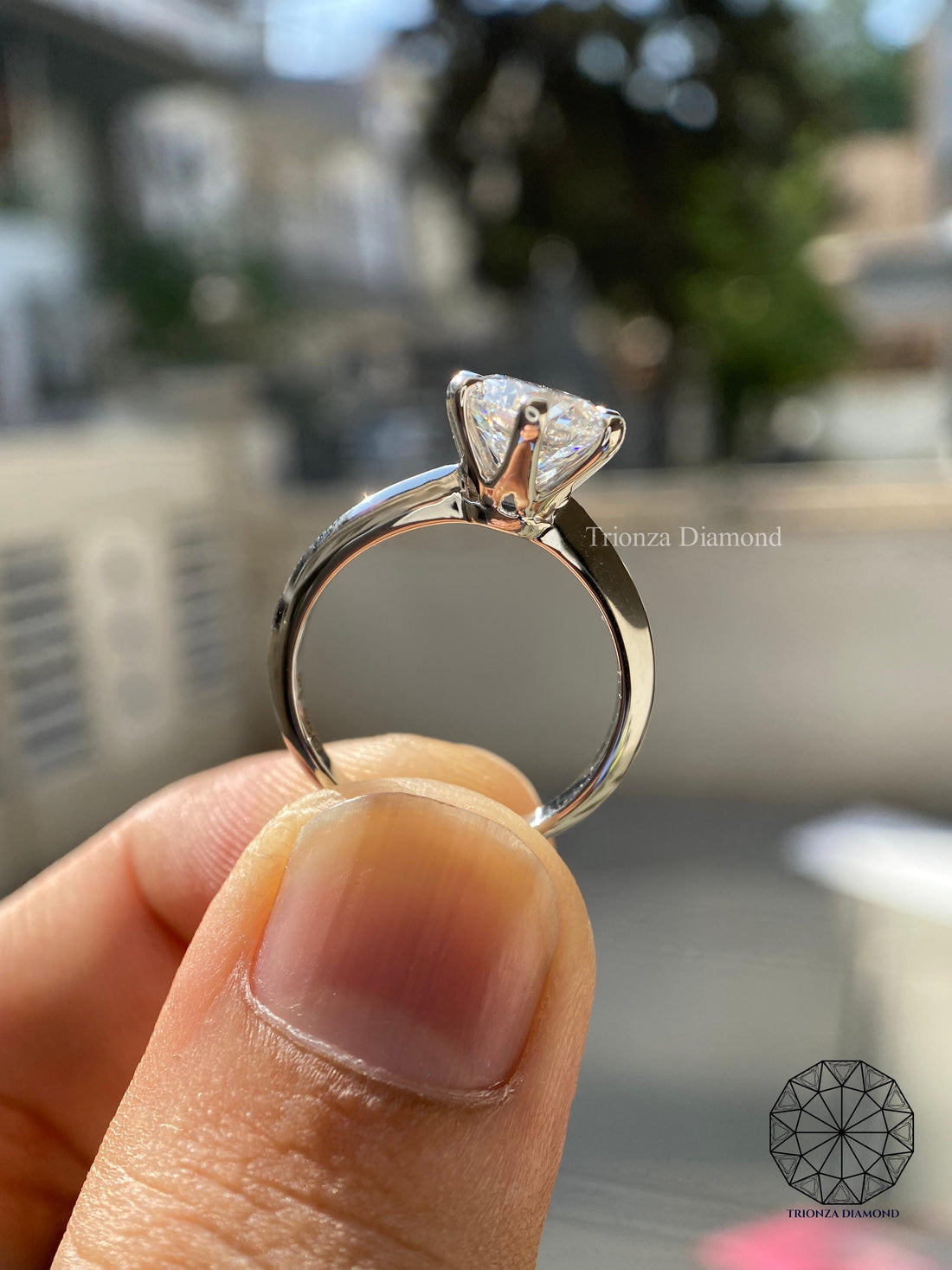 Round cut lab grown diamond ring featuring a 6 prong platinum solitaire setting for her