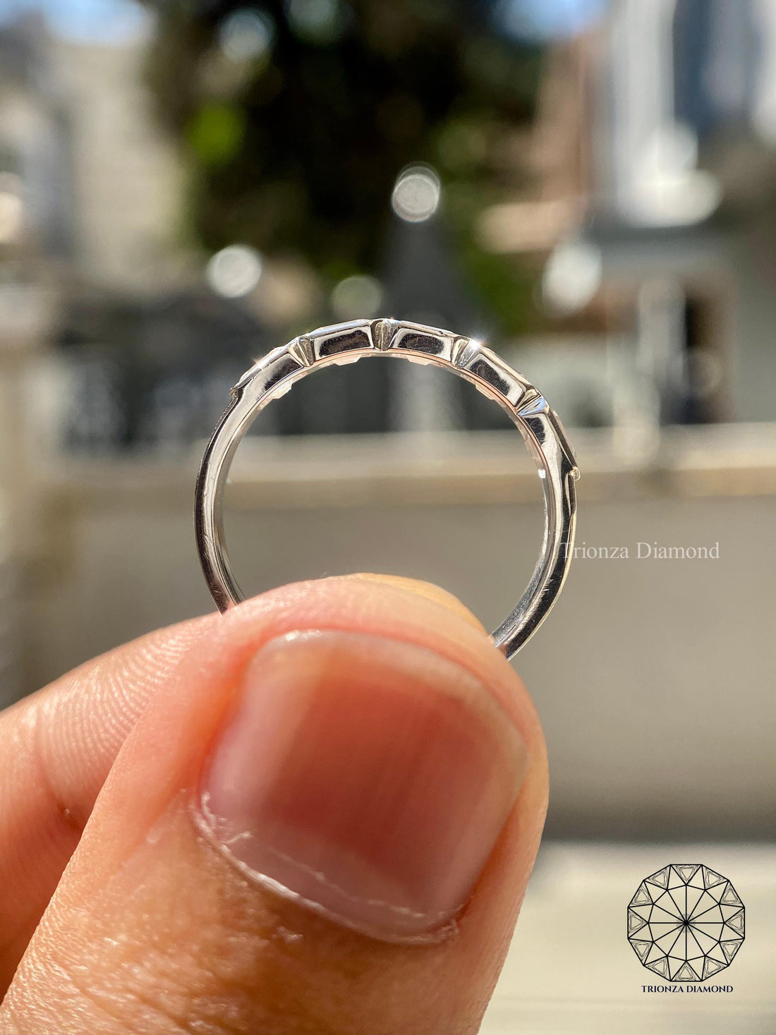 Emerald cut lab diamond 5-stone band crafted in platinum with a stackable eternity design