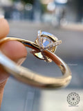 Close-up of the 3CT cushion cut diamond showing its E color and VVS2 clarity