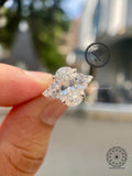 Close-up of the oval cut center diamond showing its F color and VVS2 clarity
