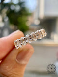 Oval eternity band ring presented in a jewelry box for gifting