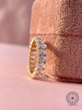 Oval step cut lab diamond full eternity band ring displayed to show continuous stone placement