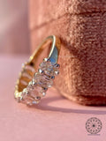 Oval cut diamond band showing clean lines and subtle luxury design details