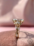 Top view of the bridal ring displaying the marquise diamond and matching side stones