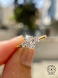 Woman wearing the oval diamond three stone ring, close-up on her hand