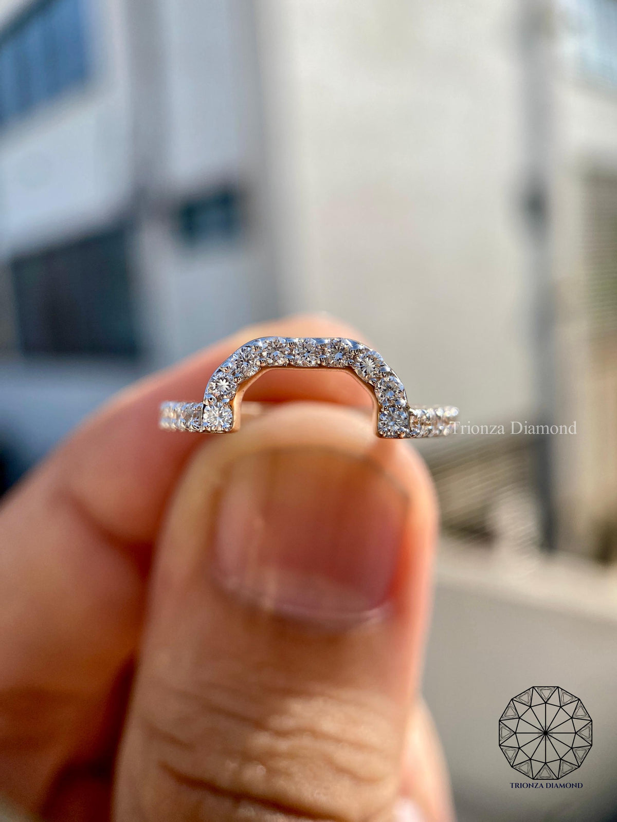 Round cut lab grown diamond pave wedding band displayed as a custom stacking ring